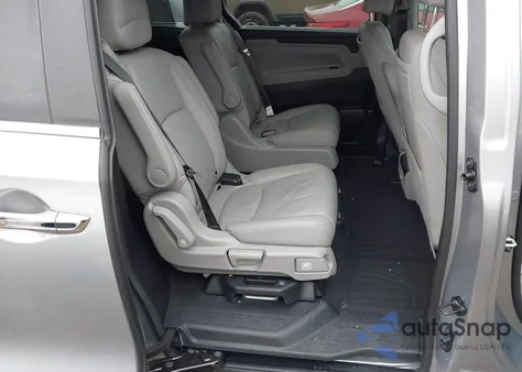 2024 Honda Odyssey Touring z USA, uszkodzony, nr VIN 5FNRL6H87RB014651